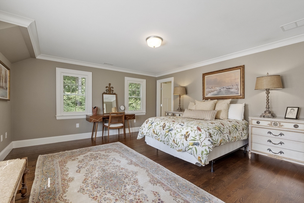 343 Nashawtuc Road Concord, MA 01742 - Photo 25 of 41 a bedroom with a large bed and a window