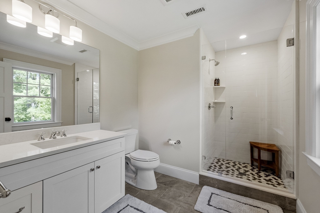 343 Nashawtuc Road Concord, MA 01742 - Photo 26 of 41 a bathroom with a sink toilet and shower