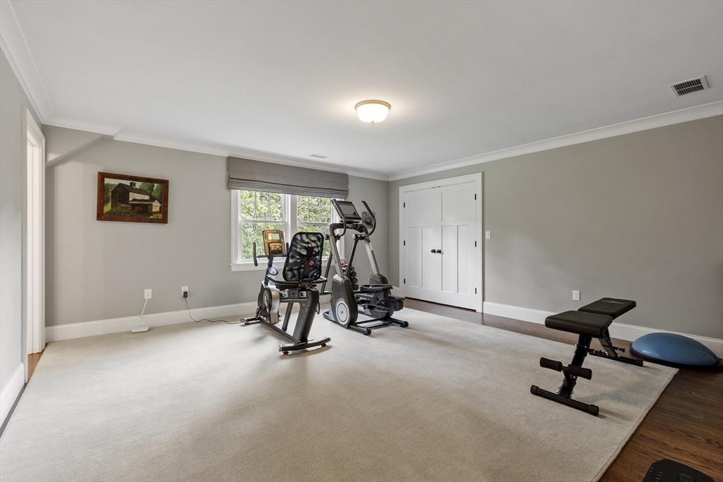 343 Nashawtuc Road Concord, MA 01742 - Photo 29 of 41 a view of a room with gym equipment