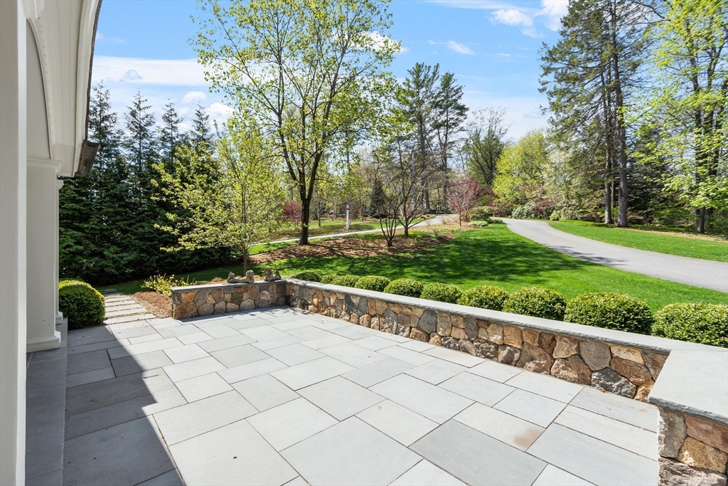 343 Nashawtuc Road Concord, MA 01742 - Photo 37 of 41 a view of a back yard of the house