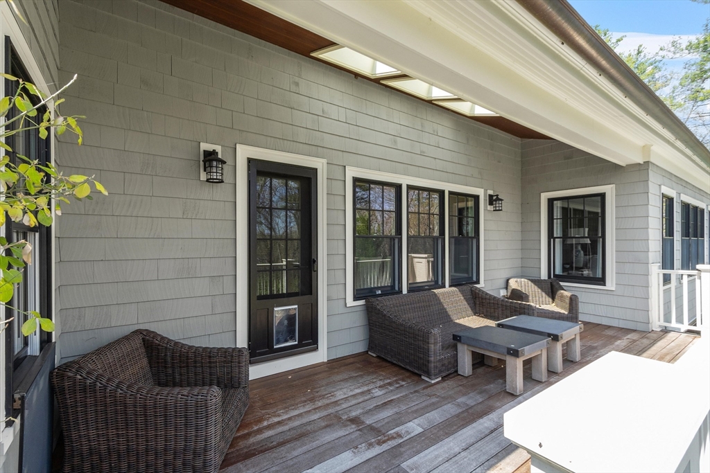 343 Nashawtuc Road Concord, MA 01742 - Photo 39 of 41 a building outdoor space with patio furniture
