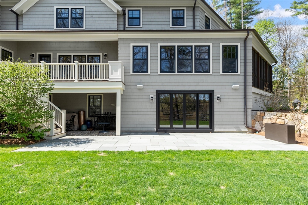 343 Nashawtuc Road Concord, MA 01742 - Photo 40 of 41 front view of a house with a yard