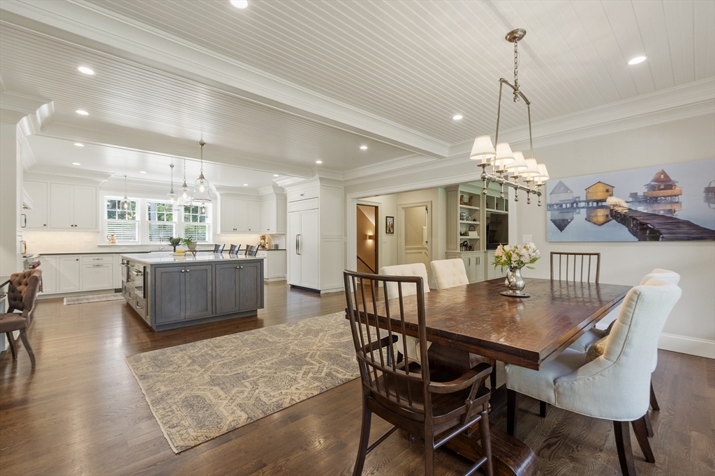 343 Nashawtuc Road Concord, MA 01742 - Photo 6 of 41 a view of a dining room with furniture and chandelier