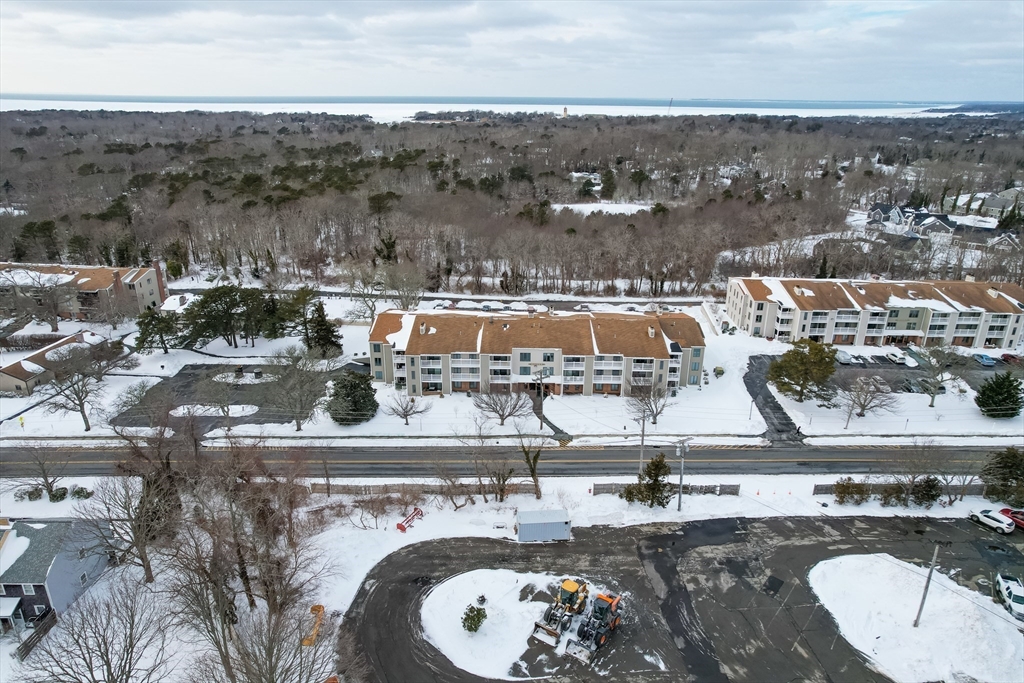 42 Old Colony Way, Unit 29 Orleans, MA 02653 - Photo 17 of 18 a view of a water with a large building