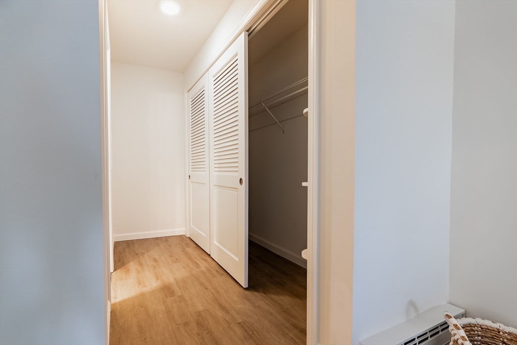 42 Old Colony Way, Unit 29 Orleans, MA 02653 - Photo 7 of 18 a view of a room with wooden floor and a window