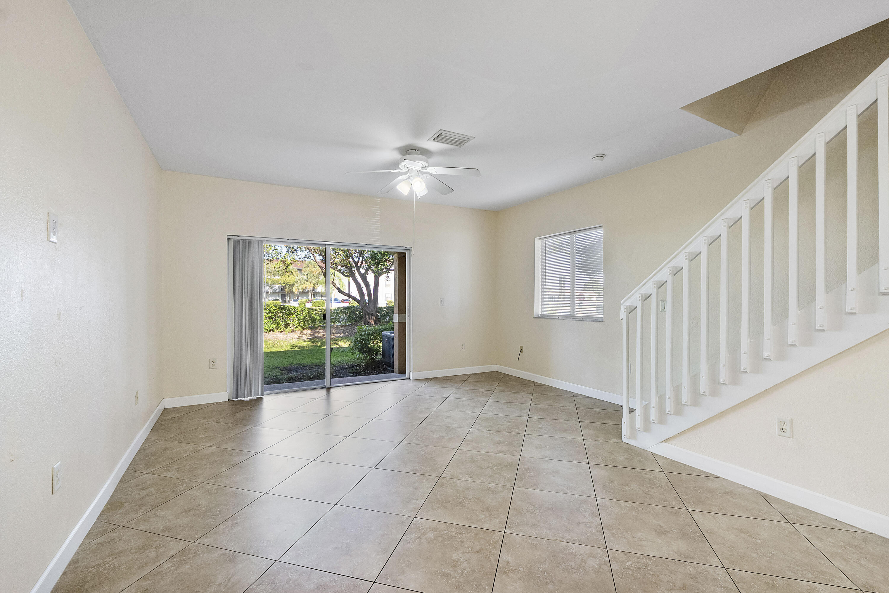 5910 Riverside Avenue Tamarac, FL 33321 - Photo 14 of 47 a view of an empty room with a window