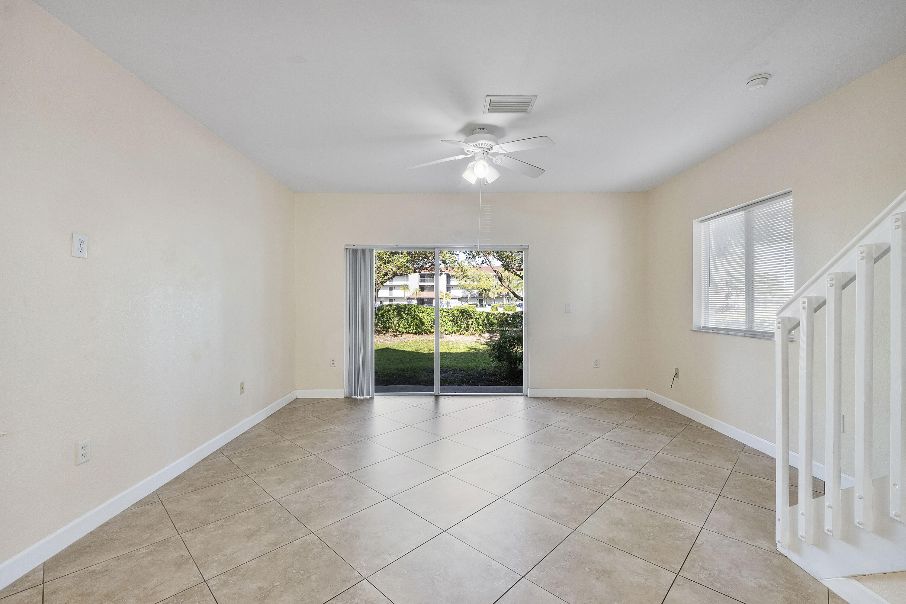 5910 Riverside Avenue Tamarac, FL 33321 - Photo 15 of 47 a view of an empty room with a window