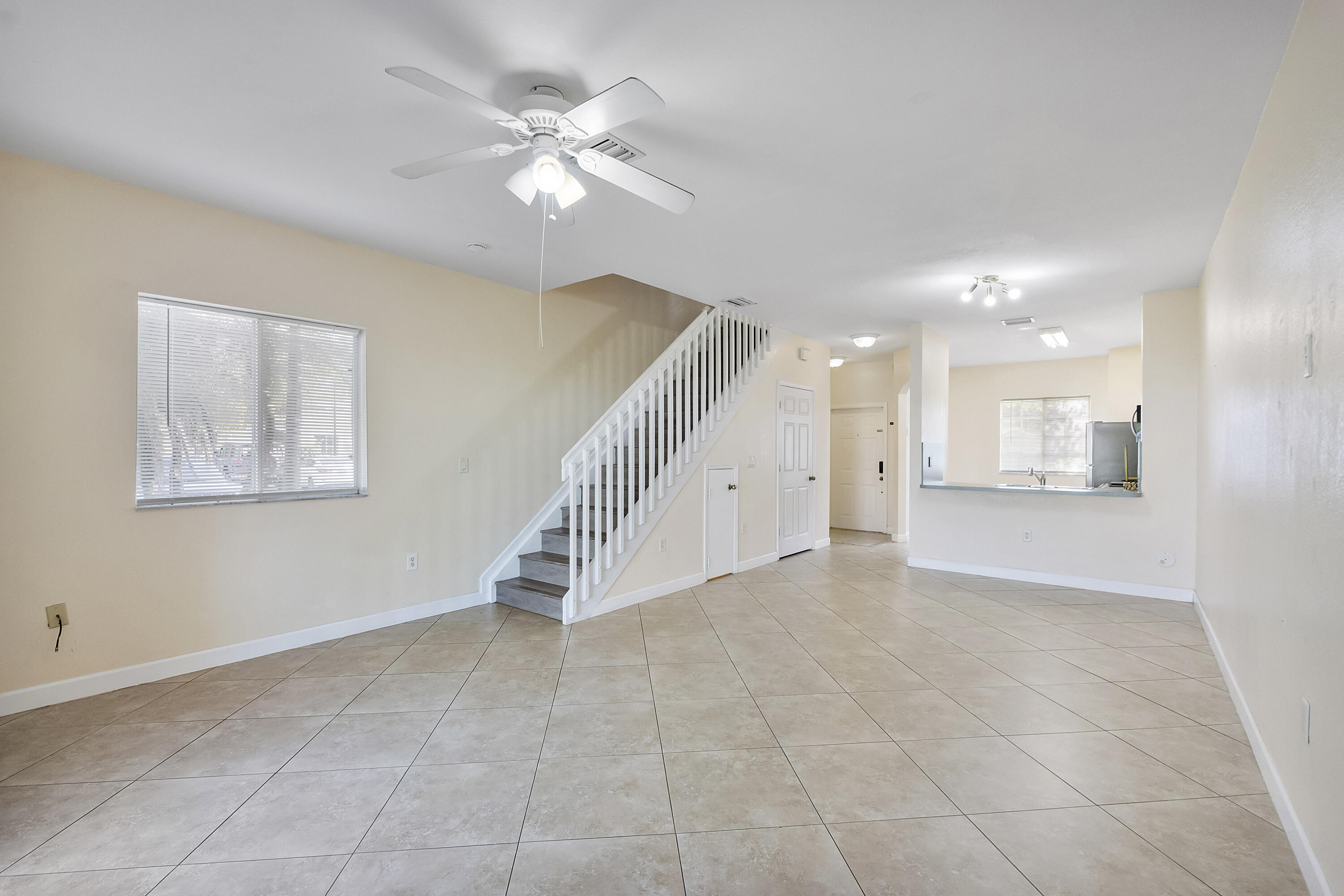 5910 Riverside Avenue Tamarac, FL 33321 - Photo 16 of 47 a view of an empty room with a window