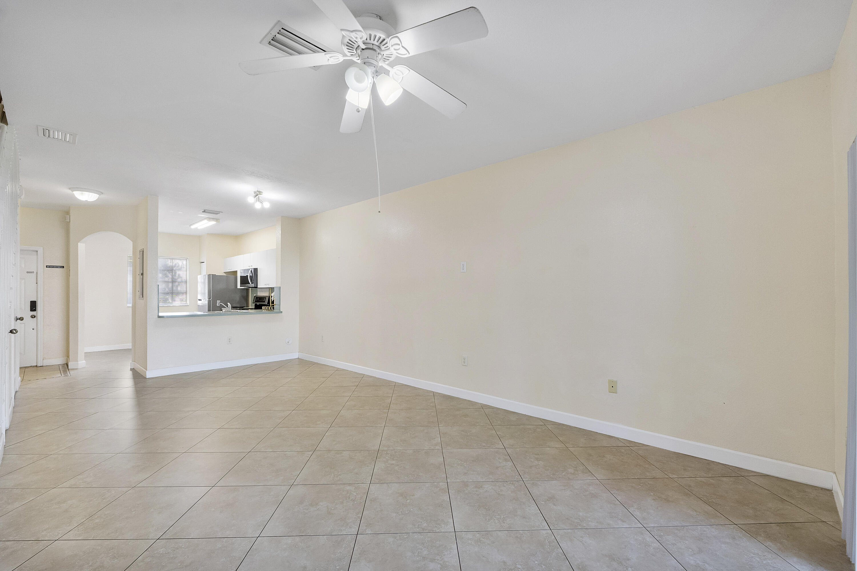 5910 Riverside Avenue Tamarac, FL 33321 - Photo 18 of 47 a view of a kitchen with a sink and a window