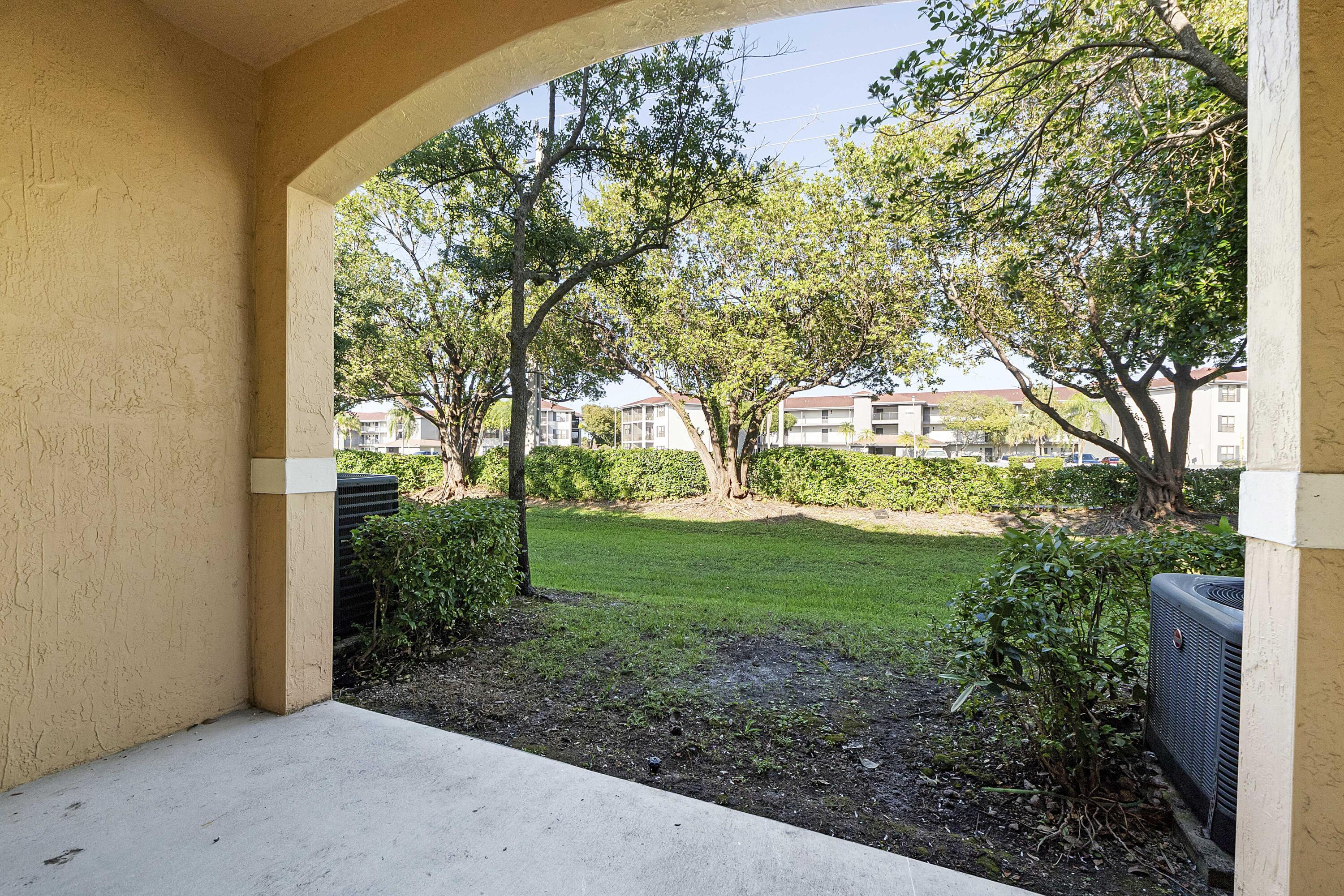 5910 Riverside Avenue Tamarac, FL 33321 - Photo 30 of 47 a view of backyard with green space