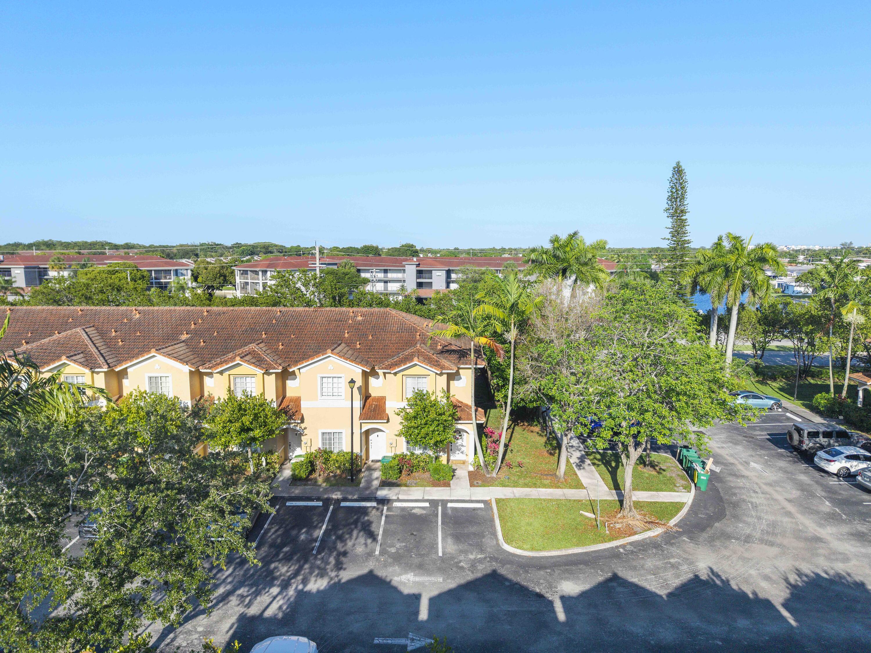 5910 Riverside Avenue Tamarac, FL 33321 - Photo 39 of 47 a view of a swimming pool with a patio