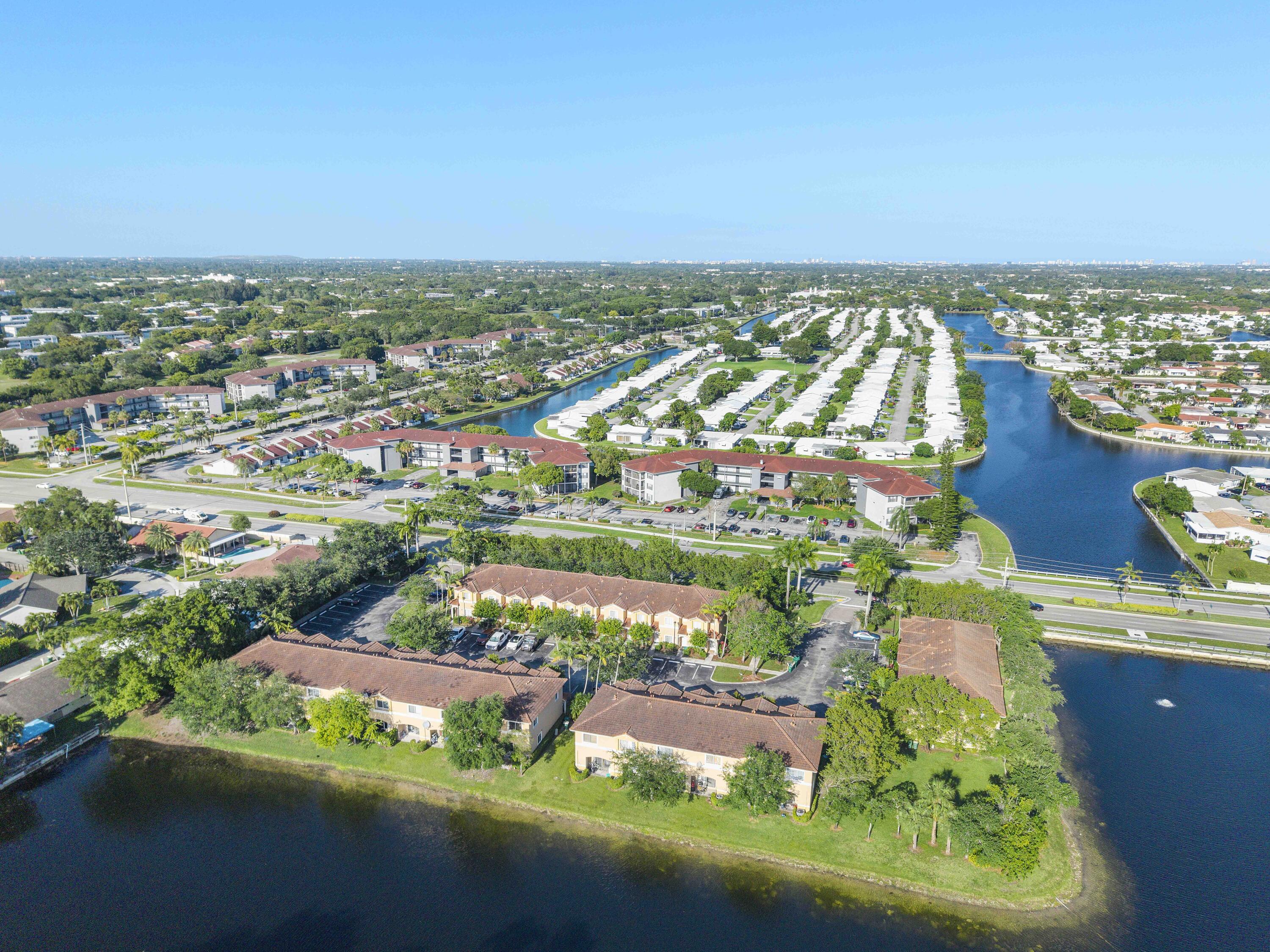 5910 Riverside Avenue Tamarac, FL 33321 - Photo 42 of 47 an aerial view of residential building and lake