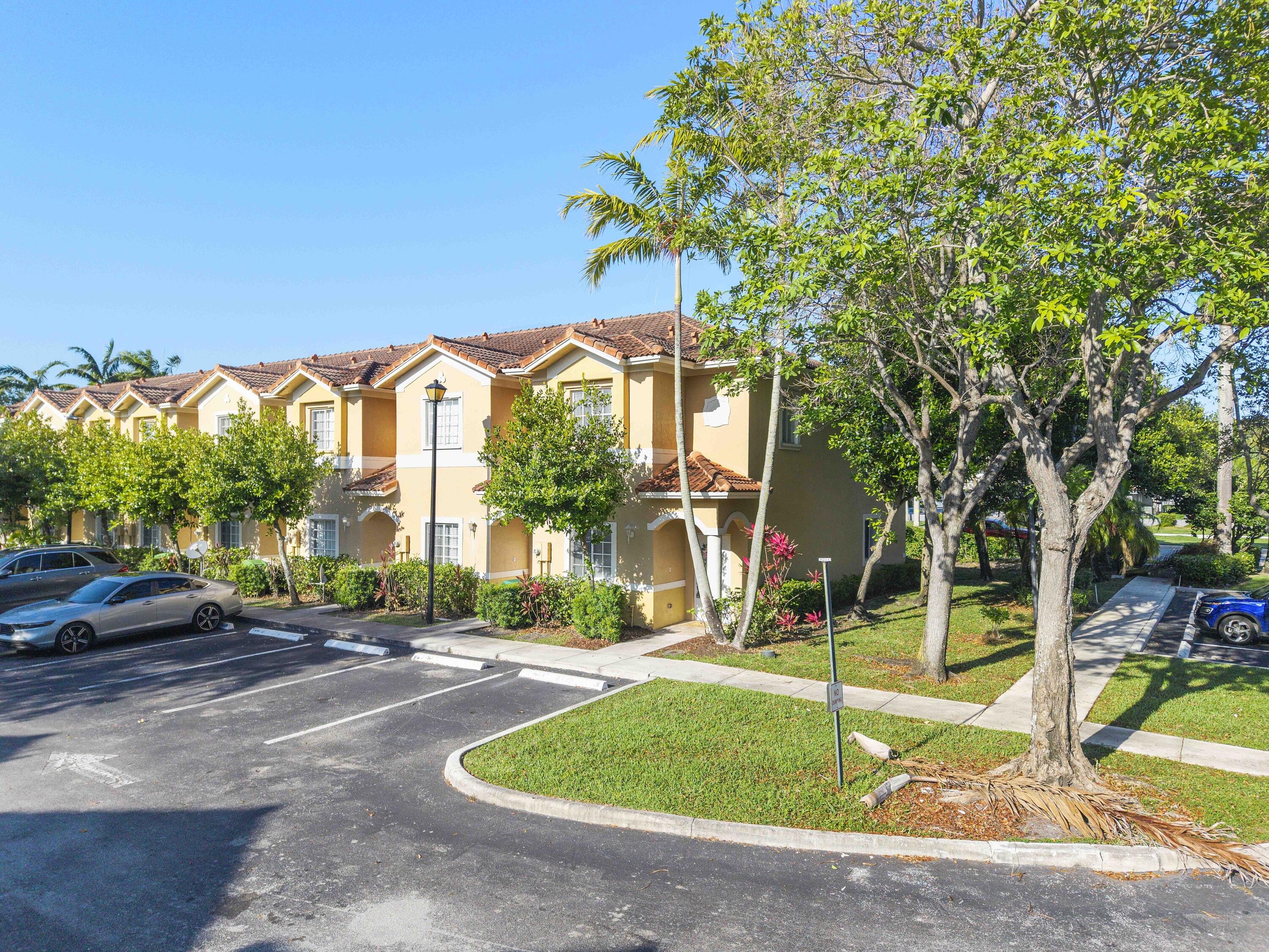 5910 Riverside Avenue Tamarac, FL 33321 - Photo 5 of 47 a view of a house with a backyard