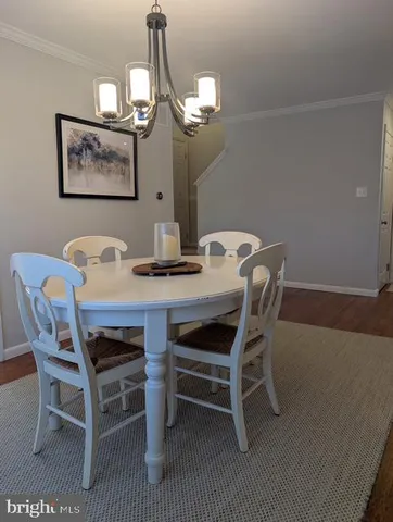 a kitchen with stainless steel appliances granite countertop a sink and a stove