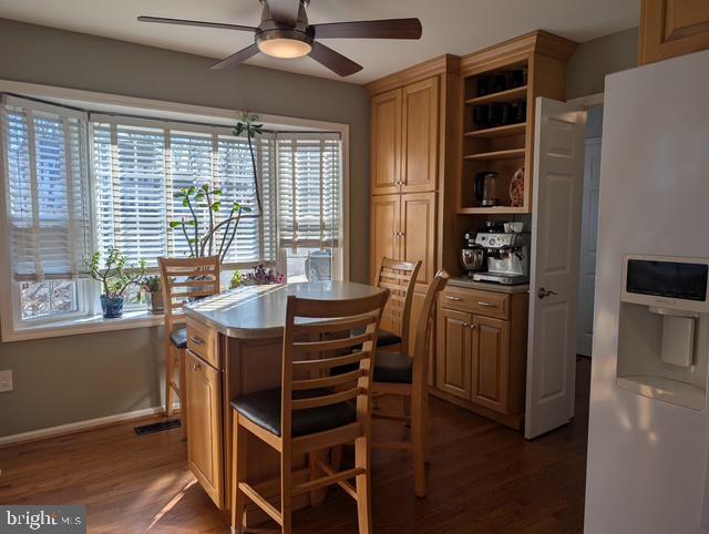 18 Kings Bridge Court Newark, DE 19702 - Photo 16 of 38 a view of a dining room with furniture window and wooden floor