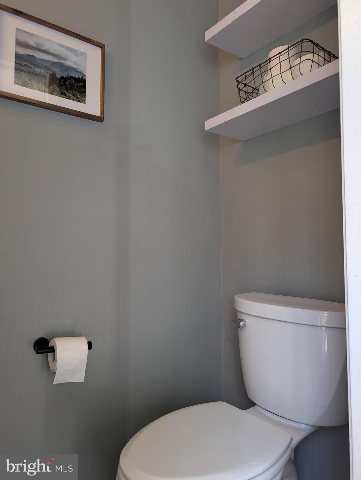 18 Kings Bridge Court Newark, DE 19702 - Photo 18 of 38 a white toilet sitting next to a white sink