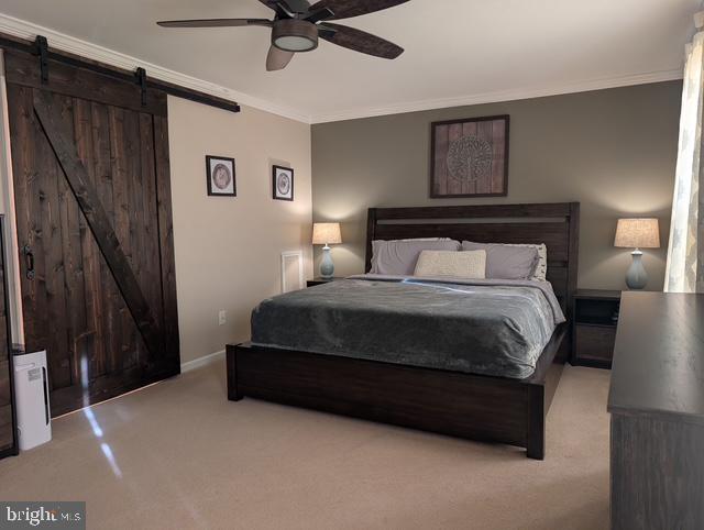 18 Kings Bridge Court Newark, DE 19702 - Photo 20 of 38 a bedroom with a bed and painting on the wall