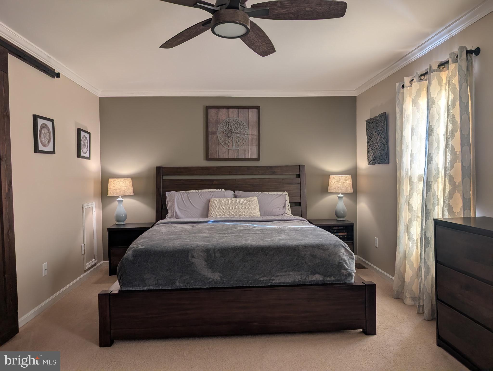 18 Kings Bridge Court Newark, DE 19702 - Photo 21 of 38 a bedroom with a bed and window