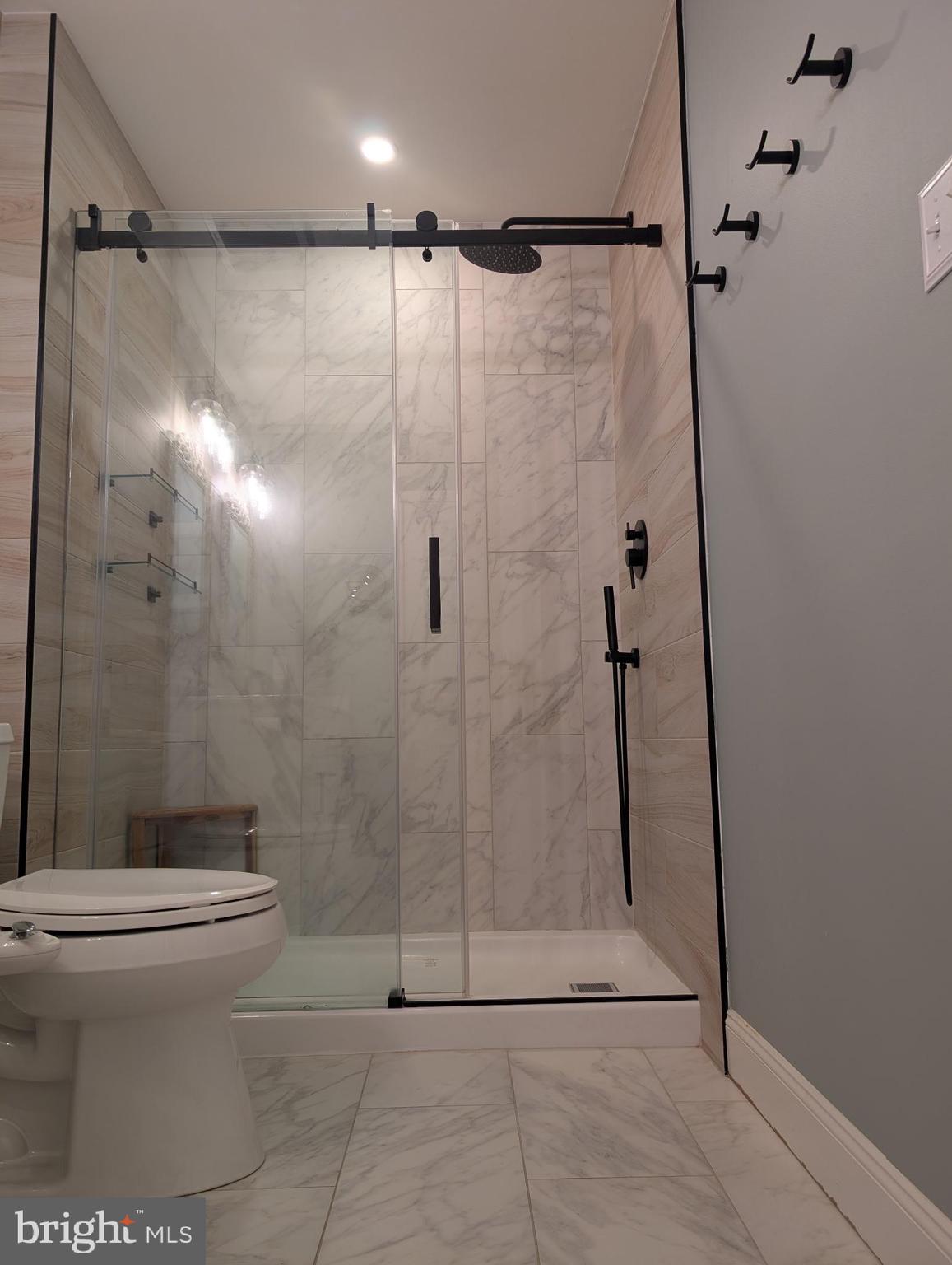 18 Kings Bridge Court Newark, DE 19702 - Photo 24 of 38 a bathroom with a shower and a toilet