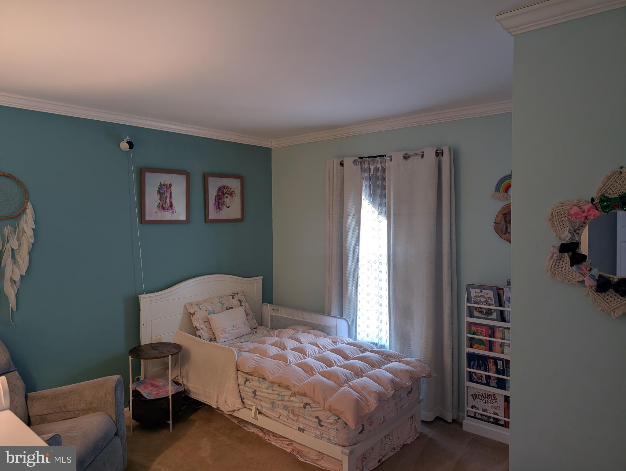 18 Kings Bridge Court Newark, DE 19702 - Photo 25 of 38 a bedroom with a bed and a window