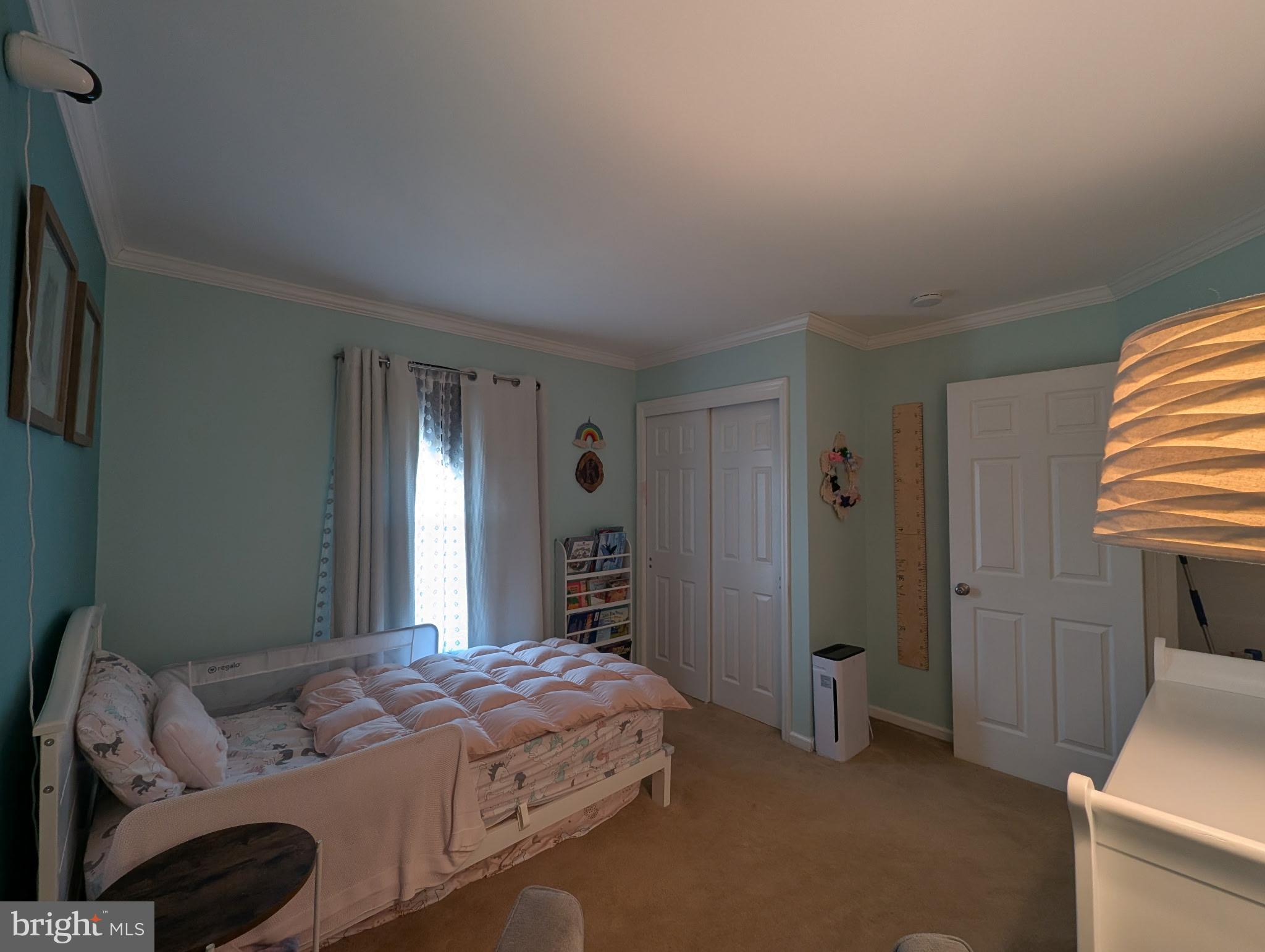 18 Kings Bridge Court Newark, DE 19702 - Photo 26 of 38 a bedroom with a bed and a window