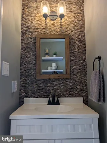 a view of roof deck with patio