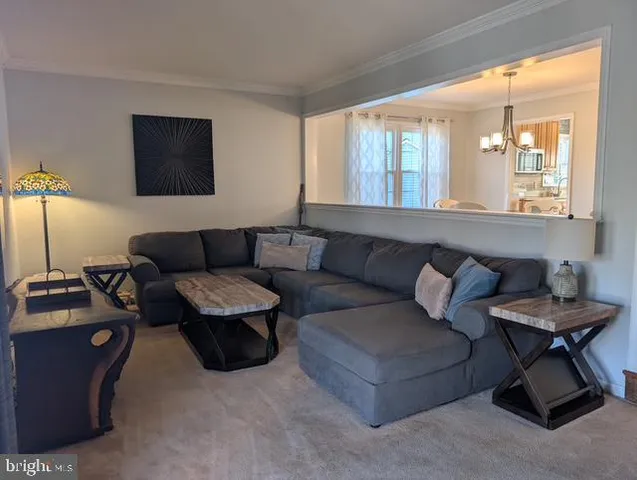 a view of roof deck with patio