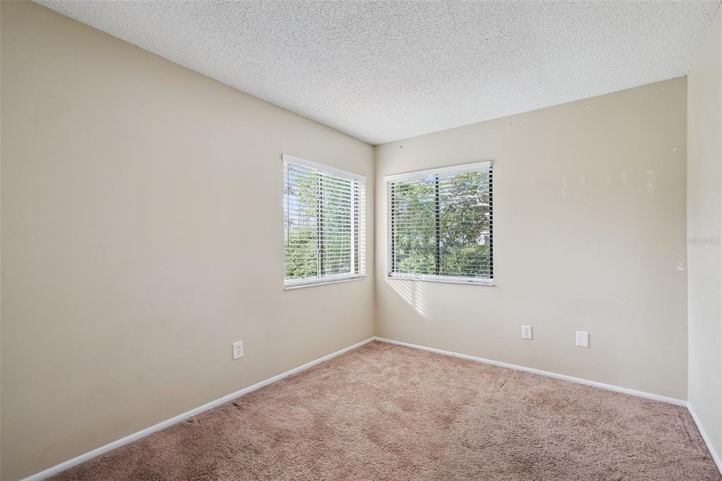 505 Tiberon Cove Road Longwood, FL 32750 - Photo 13 of 20 an empty room with windows