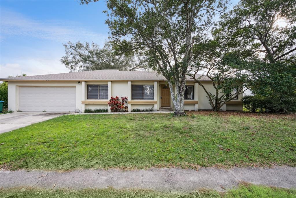 505 Tiberon Cove Road Longwood, FL 32750 - Photo 2 of 20 a front view of house with yard and green space