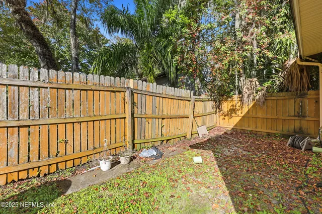 a view of a wooden deck with a patio