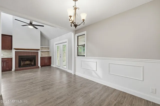 a view of a livingroom with a fireplace