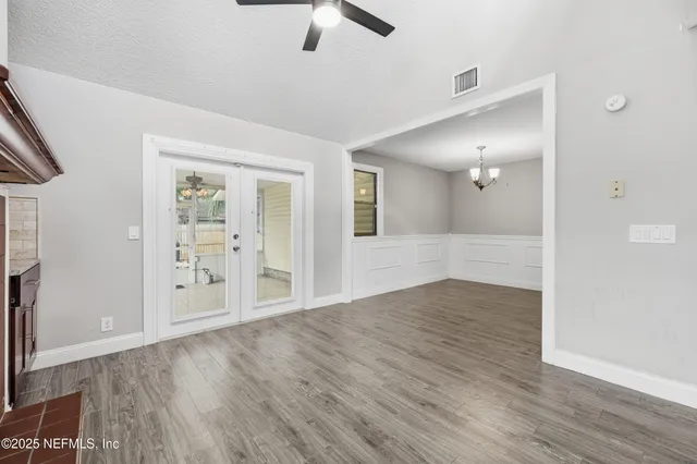a kitchen with cabinets a sink and appliances