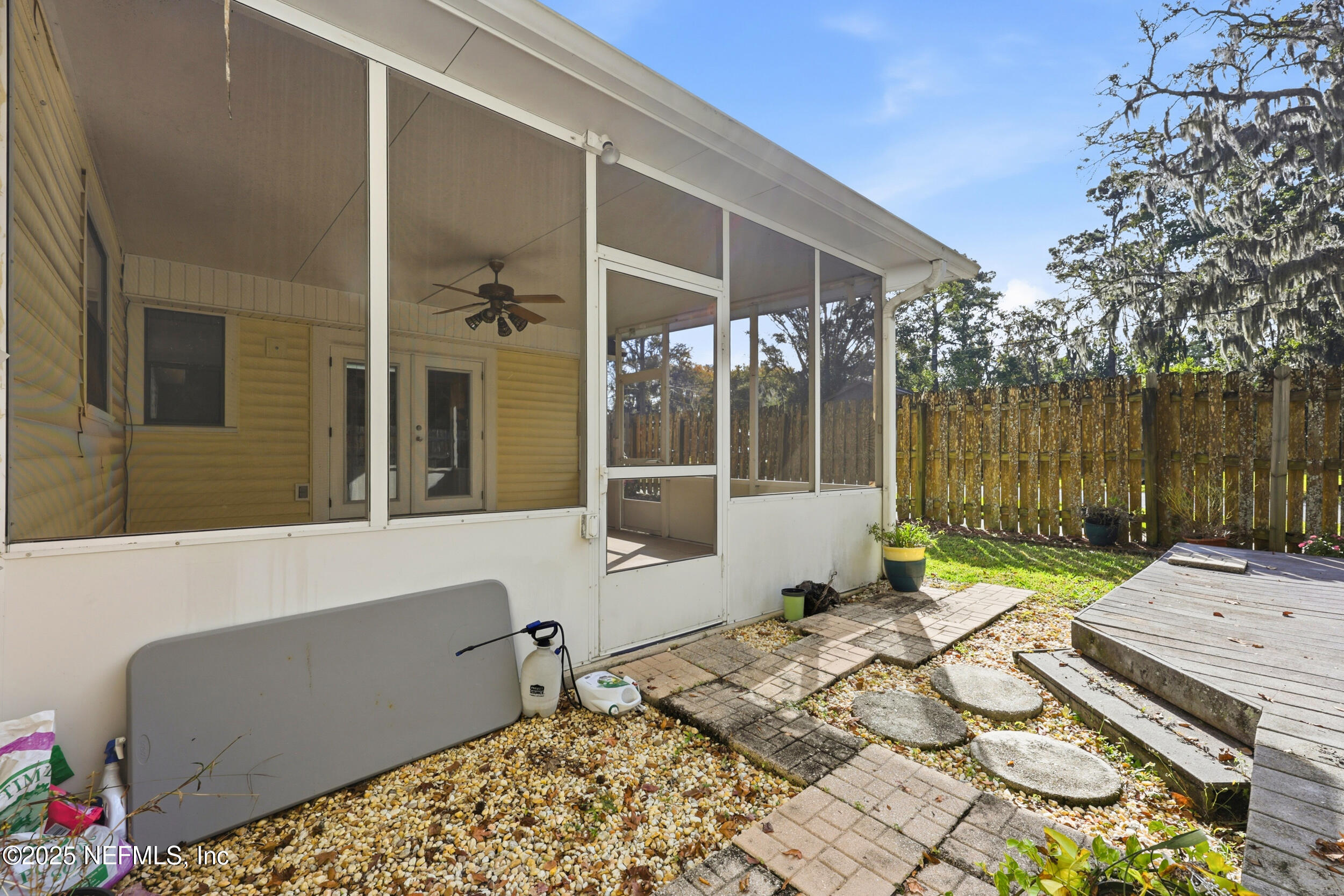 760 Plainfield Avenue Orange Park, FL 32073 - Photo 5 of 38 a view of a lounge chair on the deck