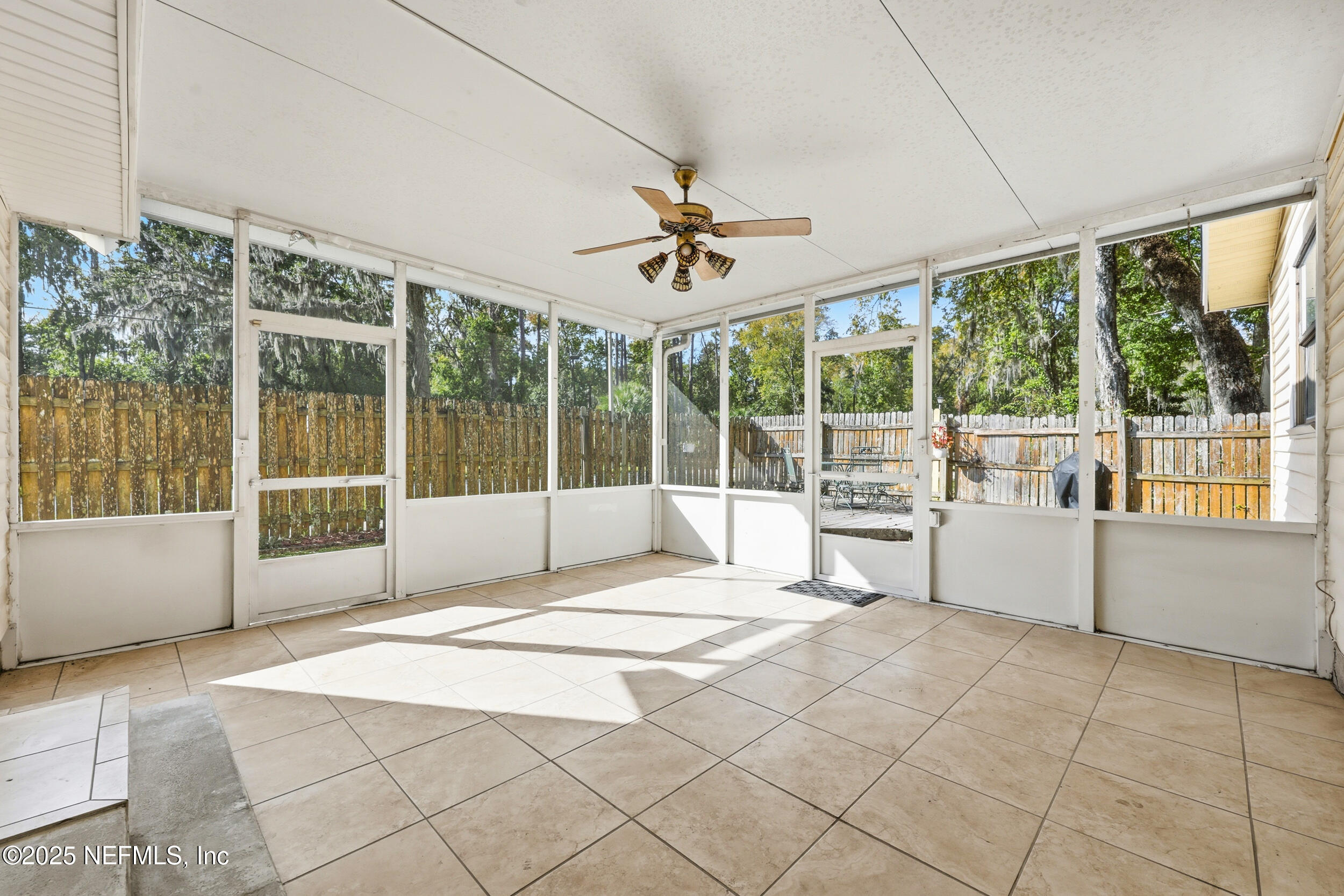 760 Plainfield Avenue Orange Park, FL 32073 - Photo 6 of 38 a view of an empty room with a window