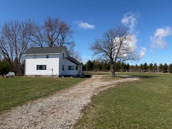 $295,000 | 7785 Saddlebag Lake Road, Lake Odessa, MI 48849