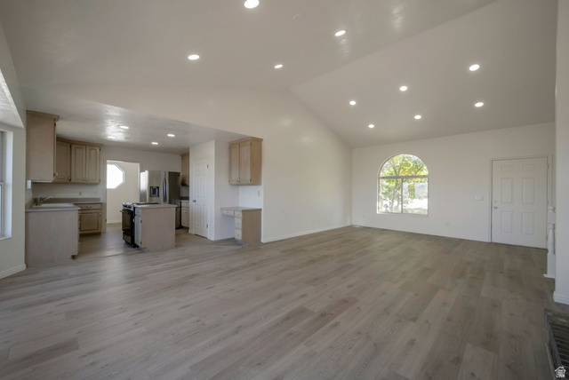 11922 Bluff View Drive Sandy, UT 84092 - Photo 8 of 30 Unfurnished living room featuring light wood finished floors and recessed lighting
