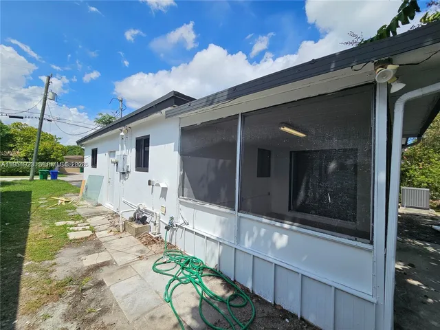 a front view of a house with patio