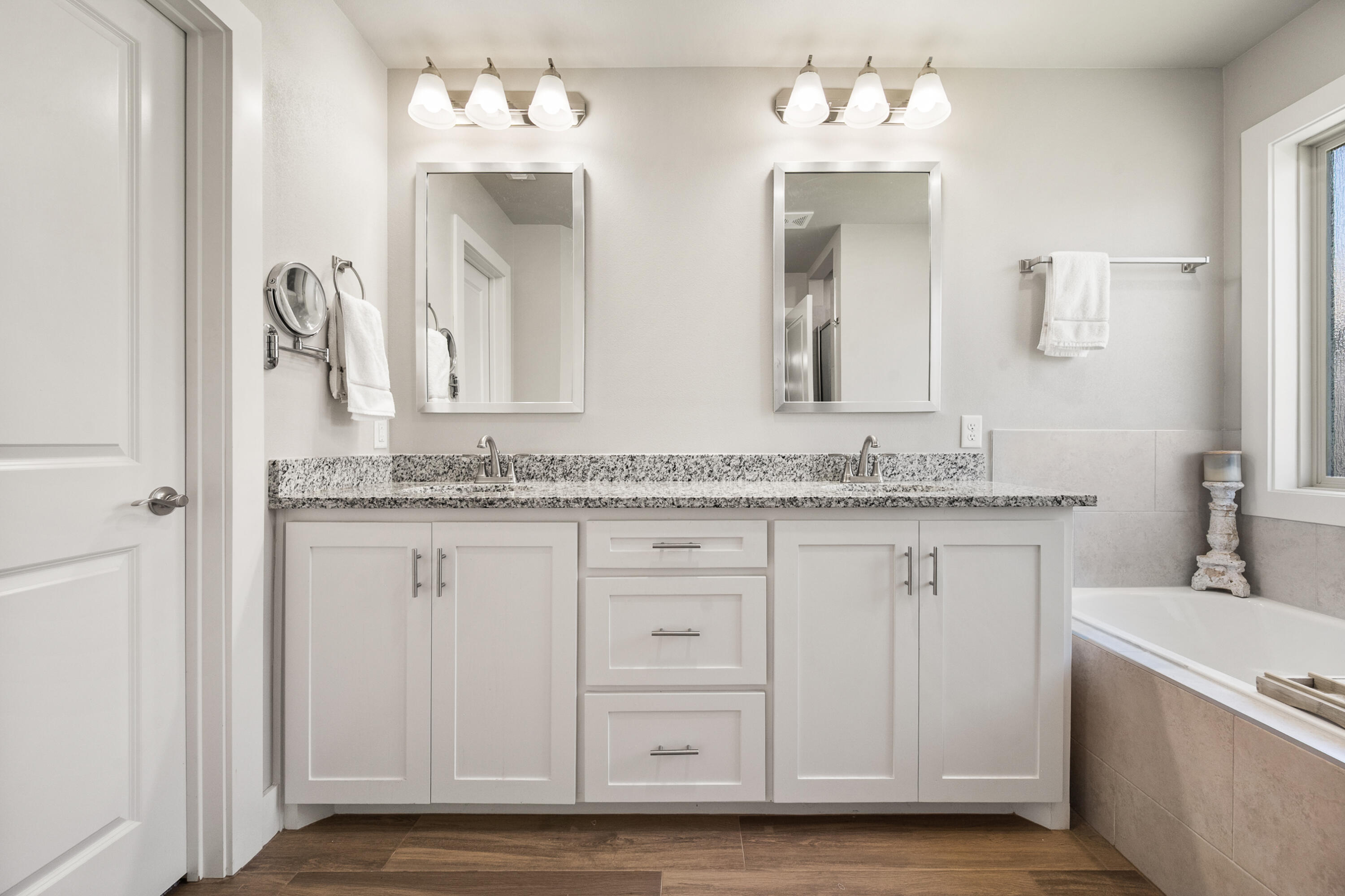 2908 137th Street Lubbock, TX 79423 - Photo 19 of 31 a bathroom with a granite countertop sink and a mirror