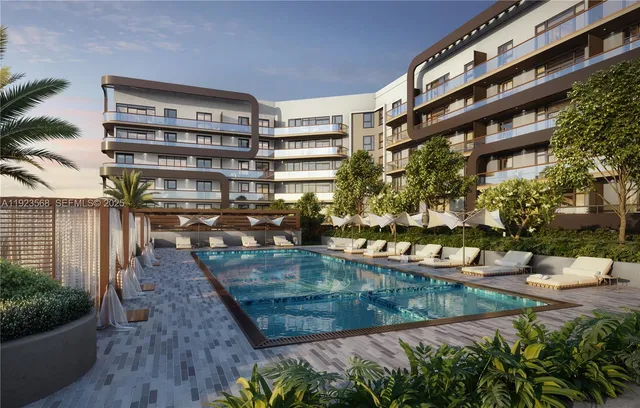 a view of a swimming pool with a patio