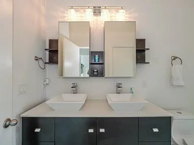 a bathroom with a sink and a mirror