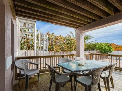 a view of a outdoor seating area with furniture