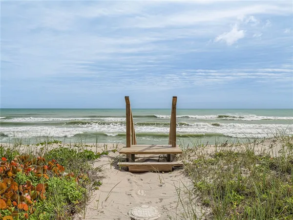 a view of a ocean and beach