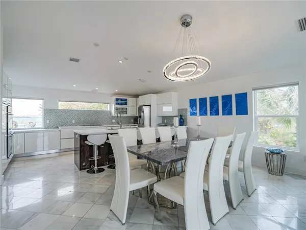 a view of a dining room with furniture