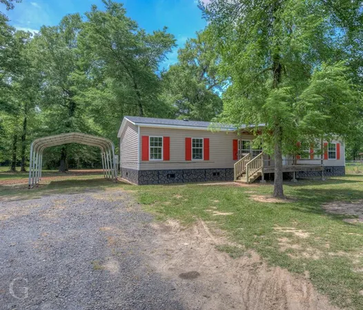 a house view with a garden space