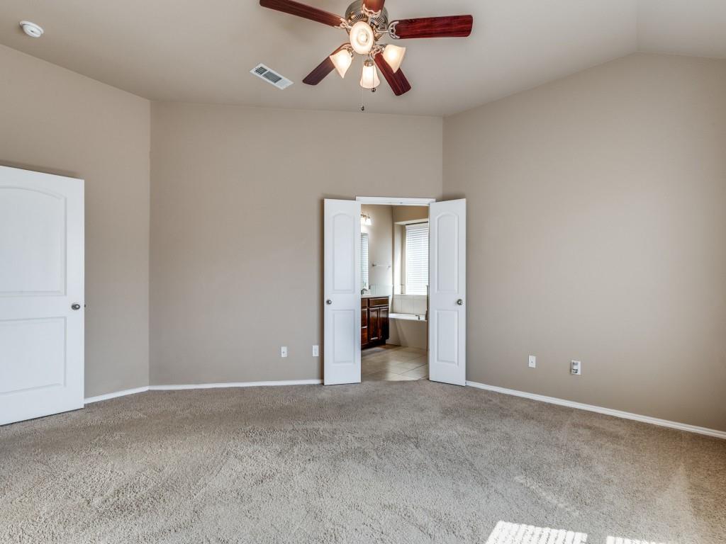 11608 Netleaf Lane Fort Worth, TX 76244 - Photo 9 of 12 a view of an empty room with chandelier fan