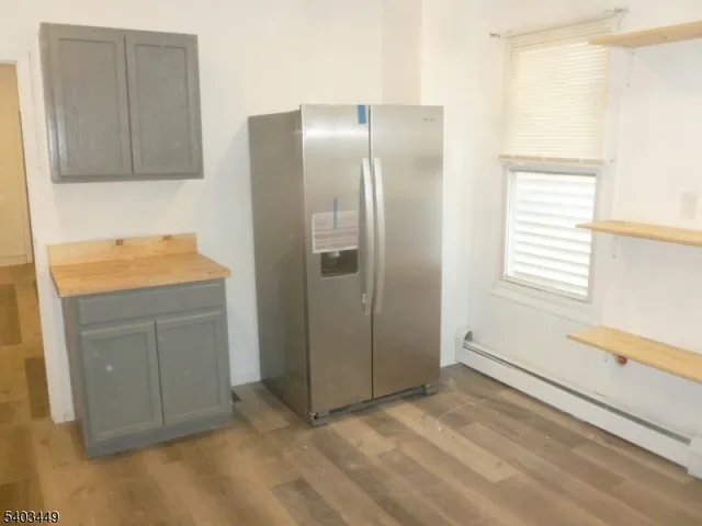 a room with closet and windows