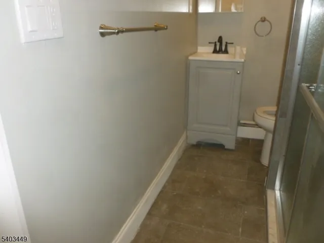 a view of a bathroom with a sink and toilet