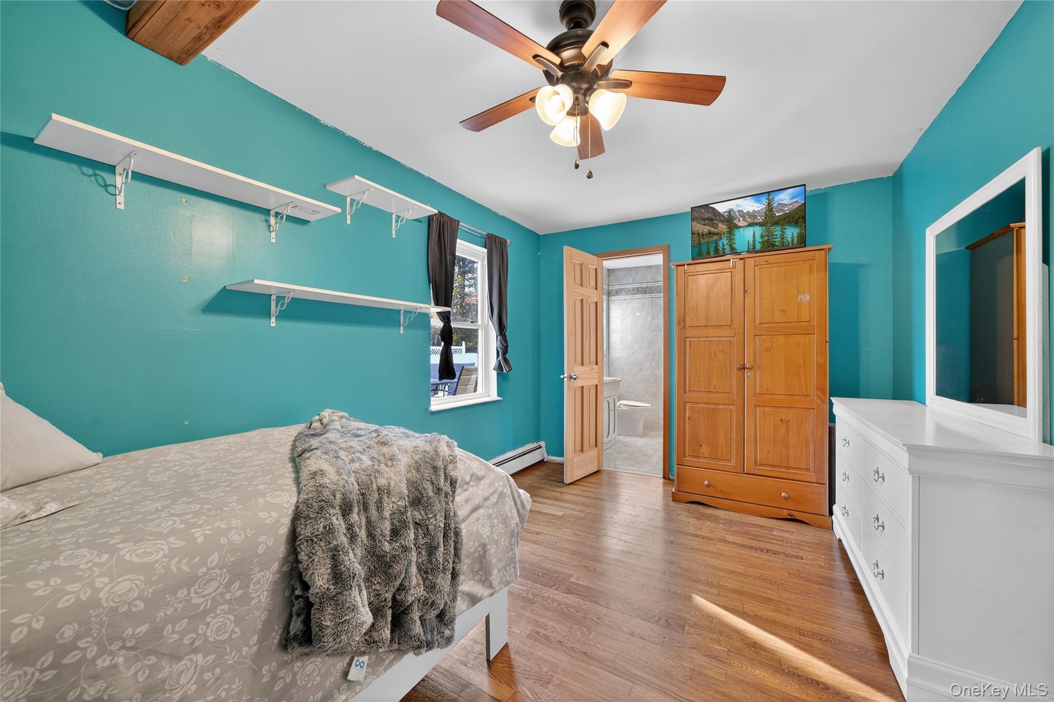 91 Meyerhoff Road Hurleyville, NY 12747 - Photo 20 of 43 a view of livingroom with furniture and ceiling fan