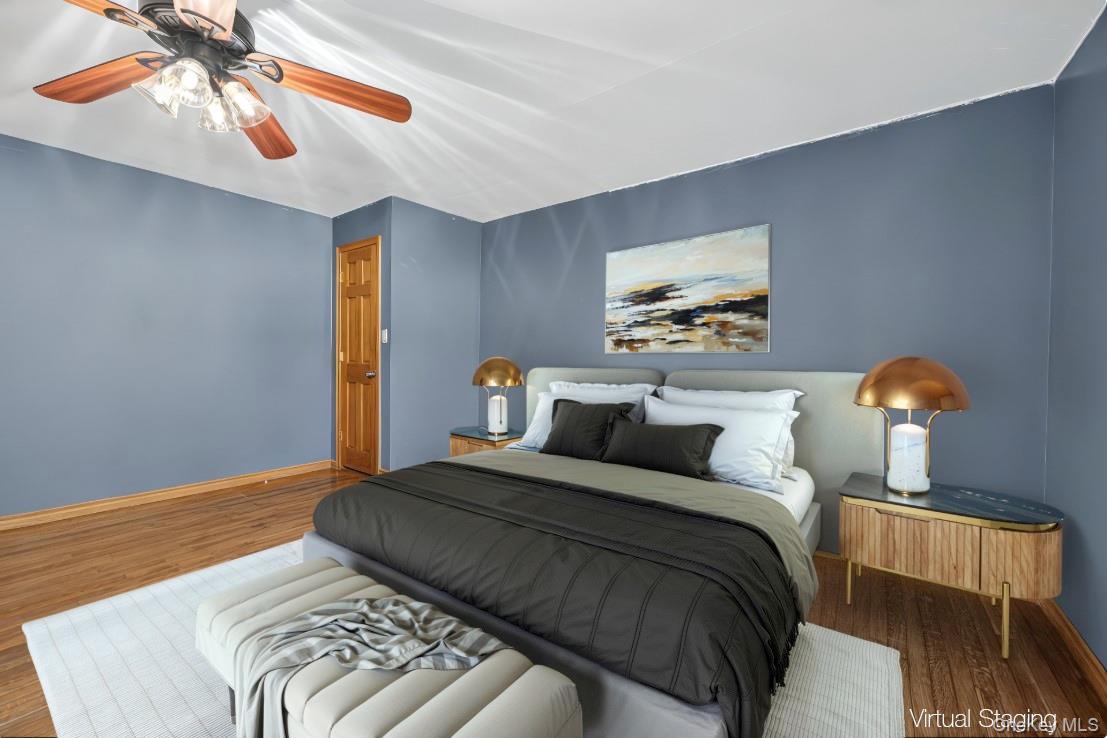 91 Meyerhoff Road Hurleyville, NY 12747 - Photo 23 of 43 a bedroom with a bed and a painting on the wall