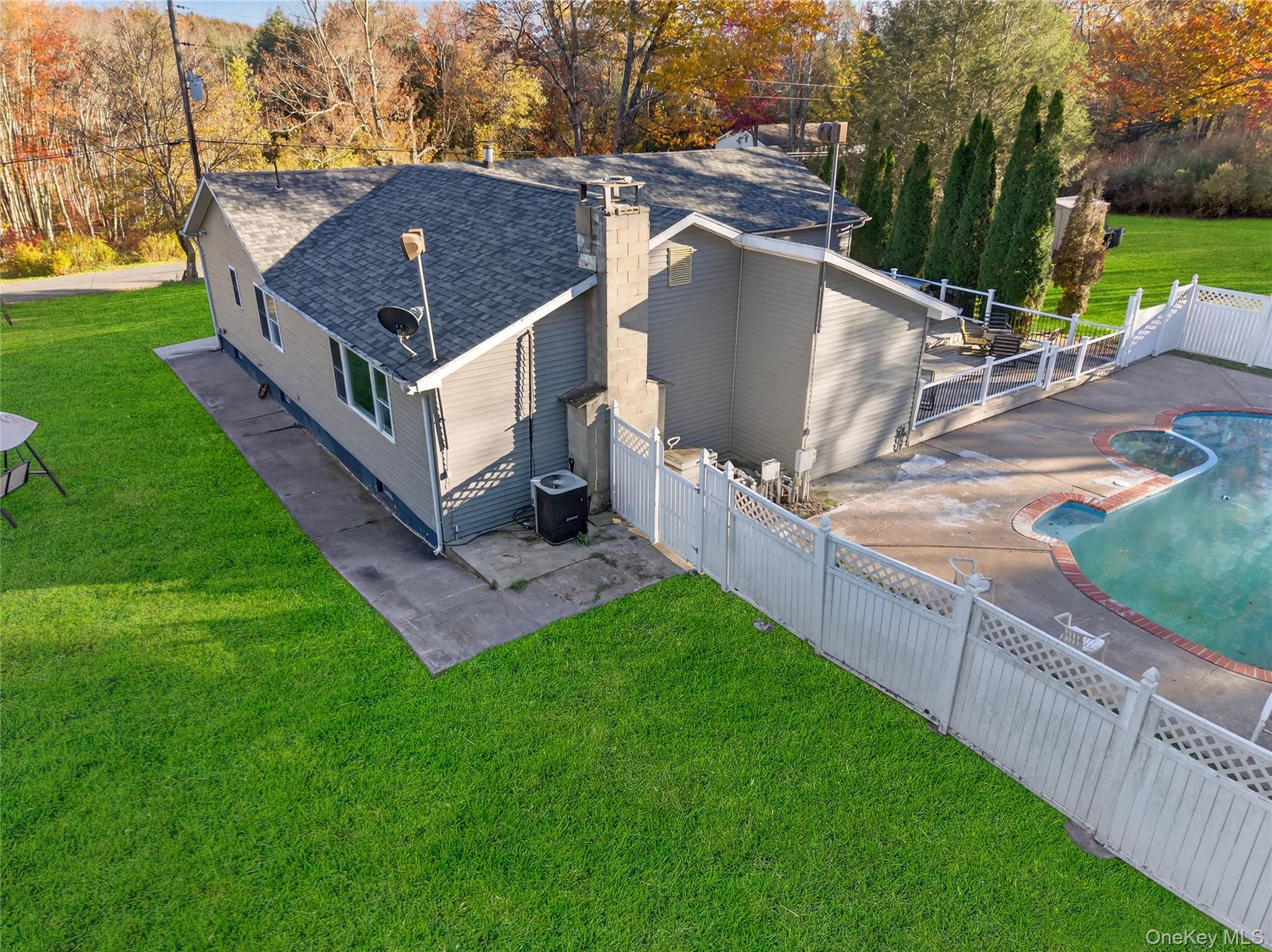 91 Meyerhoff Road Hurleyville, NY 12747 - Photo 34 of 43 a view of an house with backyard and trees